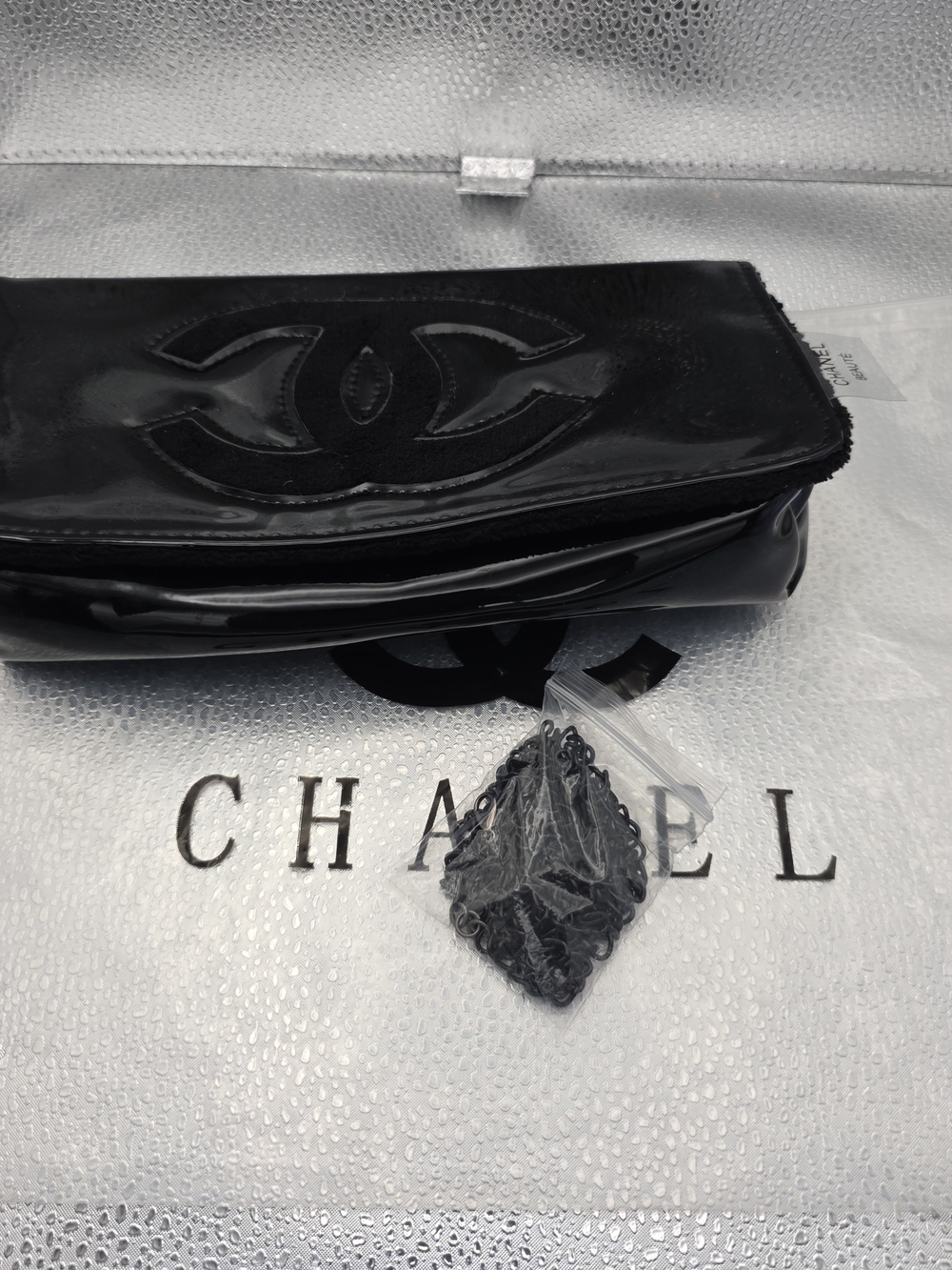 CHANEL Black Patent Leather Fold-Over Clutch with CC Motif